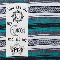Close up view of patch "You are my Sun, my Moon and all my Stars" from blanket