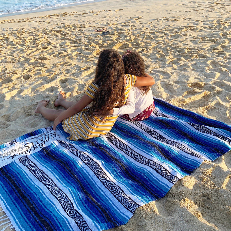 Life Style Picture of Family Mexican Blanket Being Used on the Beach
