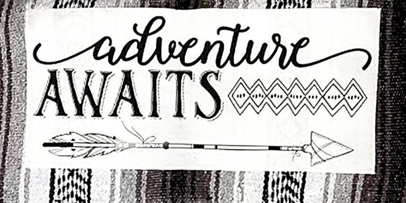 Adventure Awaits Patch stitched on mexican blanket