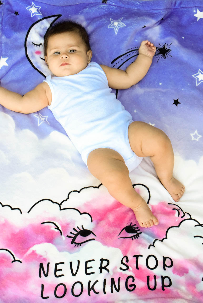 Baby Girl on Plush Baby Blanket with Never Stop Looking Graphic