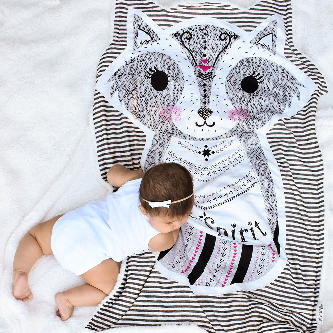 Baby Girl Crawling on Riley the Raccoon Baby Blanket