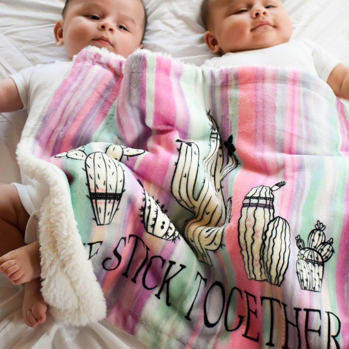 baby twin boys sharing their We Stick Together Security Blanket